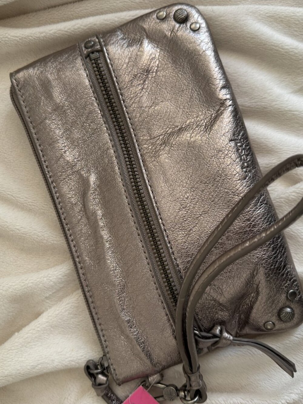 The Sak Genuine Leather Metallic Silver Wristlet Clutch with Charger
